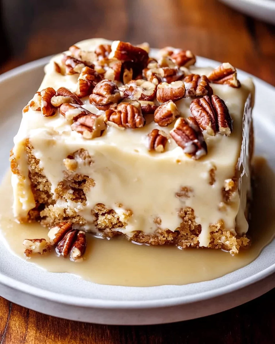 Decadent Butter Pecan Praline Poke Cake